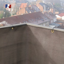 Toile brise-vue en rouleau avec œillets