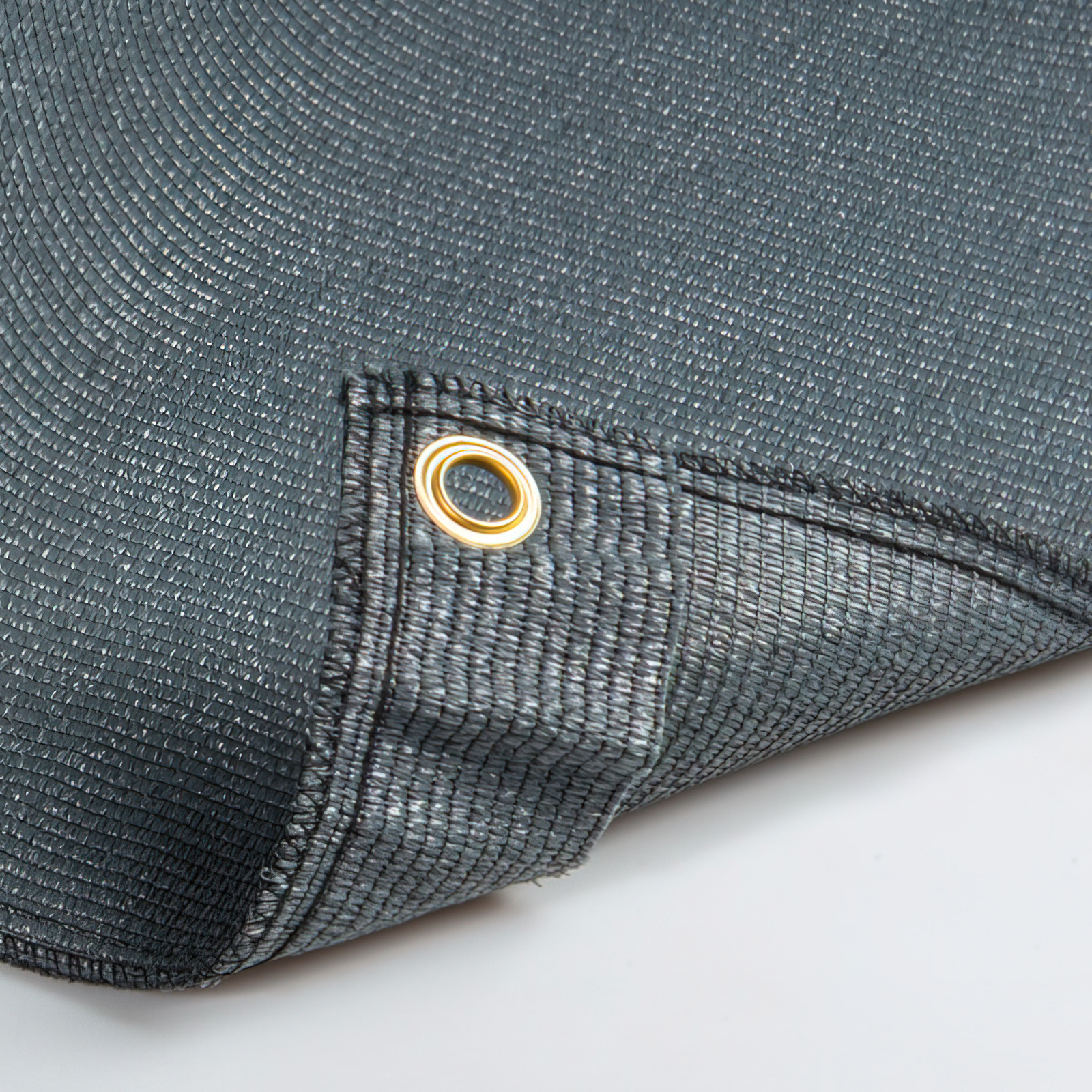 Toile brise-vue en rouleau avec œillets