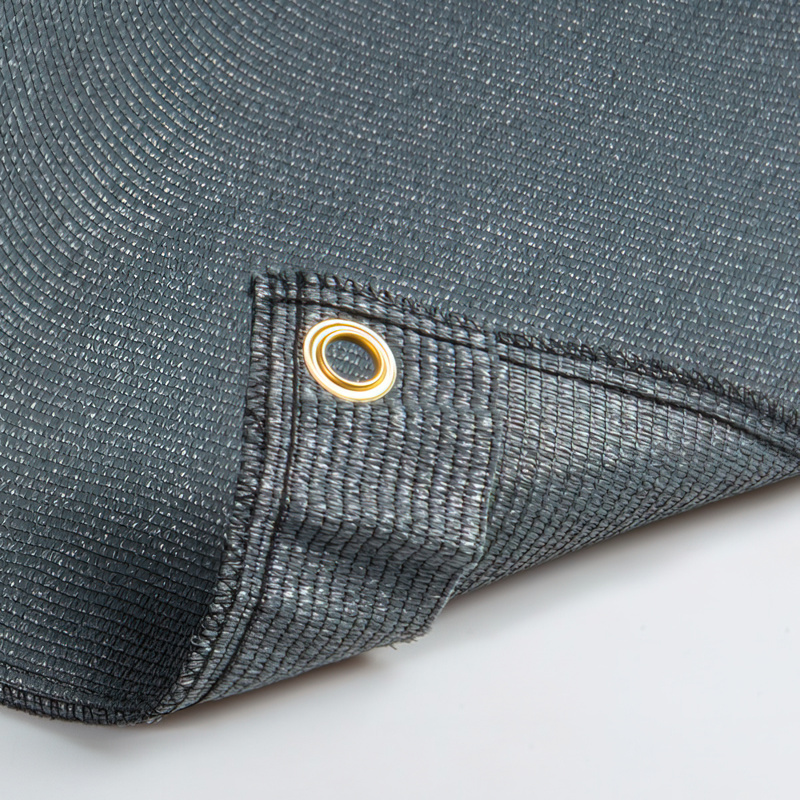 Toile brise-vue en rouleau avec œillets